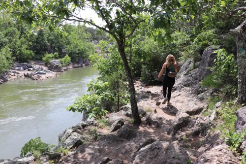 Corinne walks along the Potomac on the Riverbend Trail.
