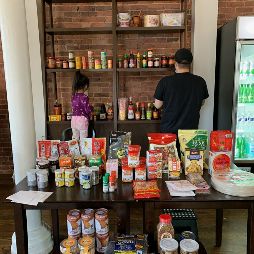 Chef Erik Bruner-Yang and daughter Amara pick ingredients. Chef Erik Bruner-Yang and daughter Amara pick ingredients.
